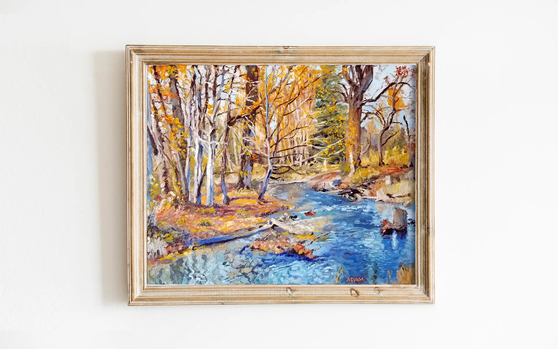 art print of oil painting depicting a vibrant blue river among orange reds and yellows of fall trees